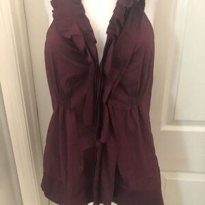 Fantastic unusual halter neck top with elasticated insets to fit any shape M